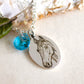 collana con cristallo a goccia azzurro acquamarina e charm ovale